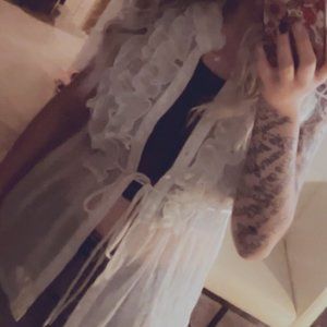 Sheer Sleeveless Button Up Shirt by XXI in a size L